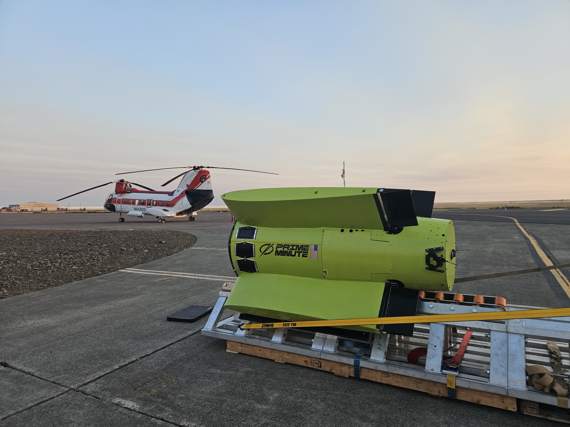 Helicopter carrying a precision guided suppression unit