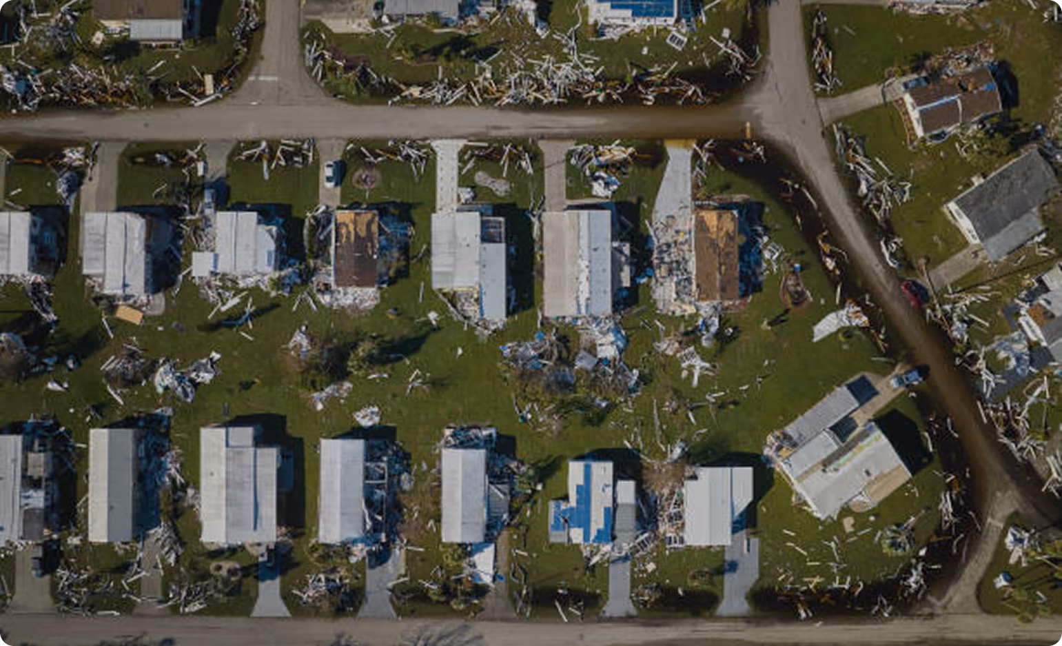 Aerial view of homes and land affected by a disaster